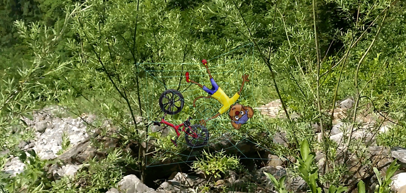 Bannerbild - Extrem-Mountainbike-Sport-Maus, gefangen in einem Spinnennetz